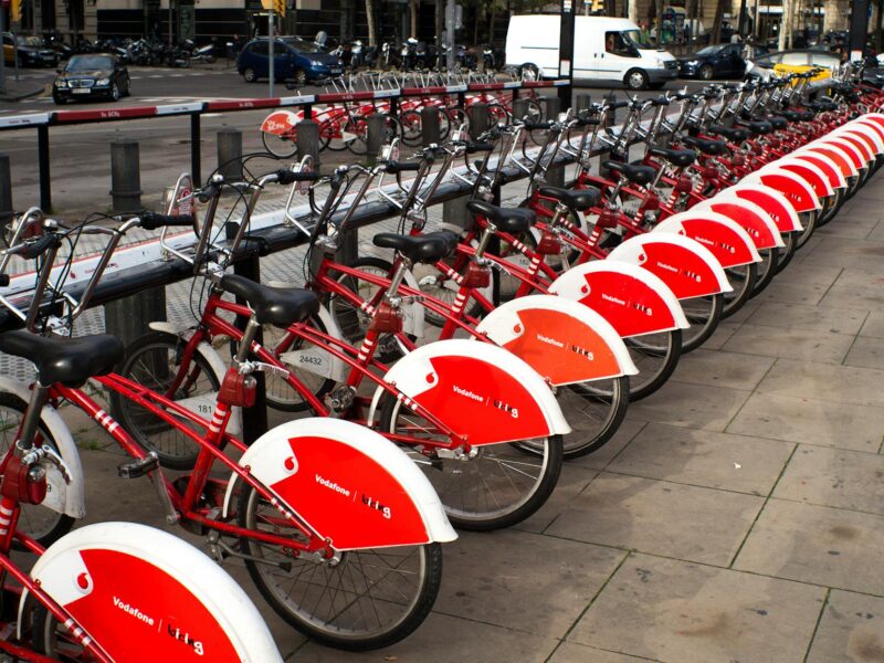 parked red and white bicycles